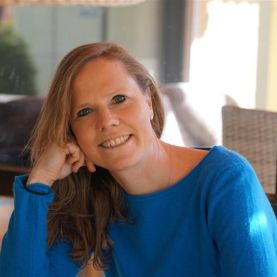 Entspanntes Portraitfoto von Dr. Kreul